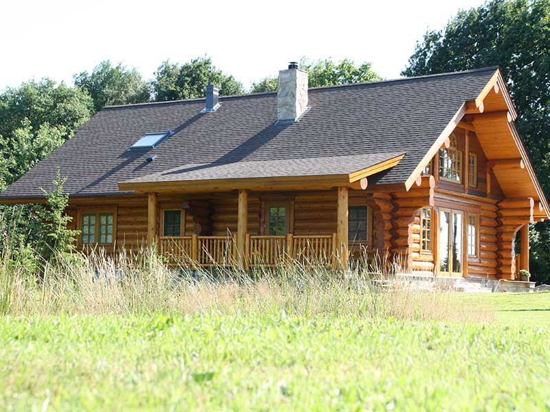 achterzijde log home eigenaren melody ranch